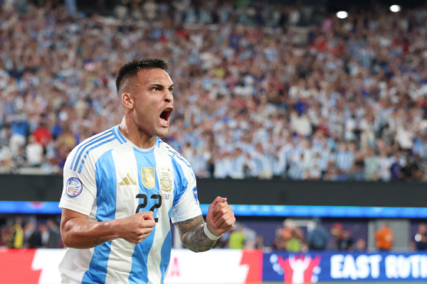 Argentina's forward #22 Lautaro Martinez celebrates after scoring a goal during the Conmebol 2024 Copa America tournament group A football match between Chile and Argentina at MetLife Stadium in East Rutherford, New Jersey on June 25, 2024. (Photo by CHARLY TRIBALLEAU / AFP) 